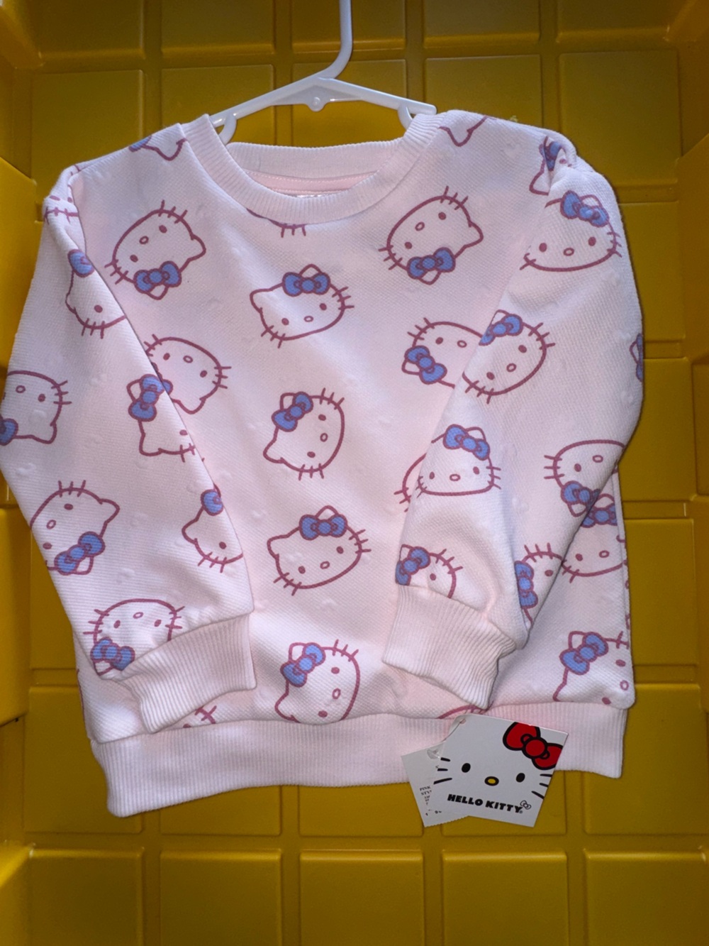 Hello Kitty Light Pink One-Piece with Blue Bows